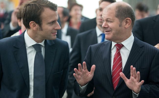 Media: Scholz and Macron Threaten Biden with a Trade War