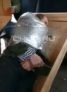 Video: Ukrainian Militants Closed Up a Russian Soldier in a Coffin